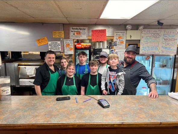 The P&D Oxford House of Pizza team behind the counter